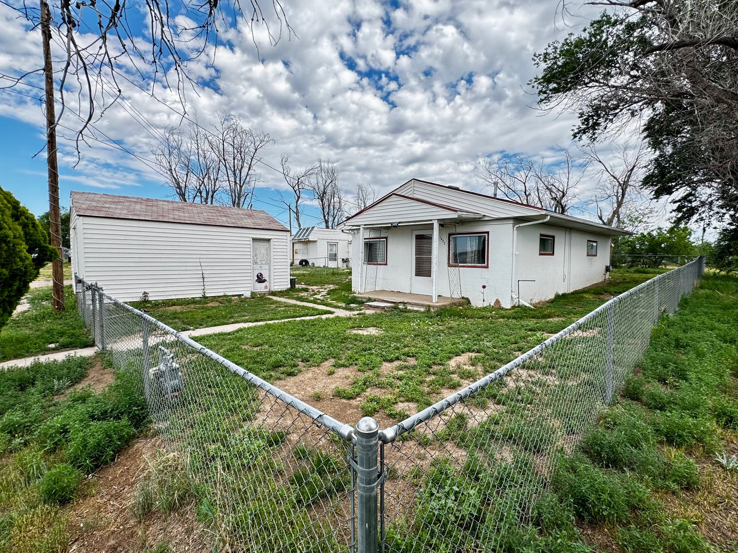 RURAL 2 BEDROOM, 1 BATHROOM, SINGLE FAMILY HOME WITH 2 GARAGES