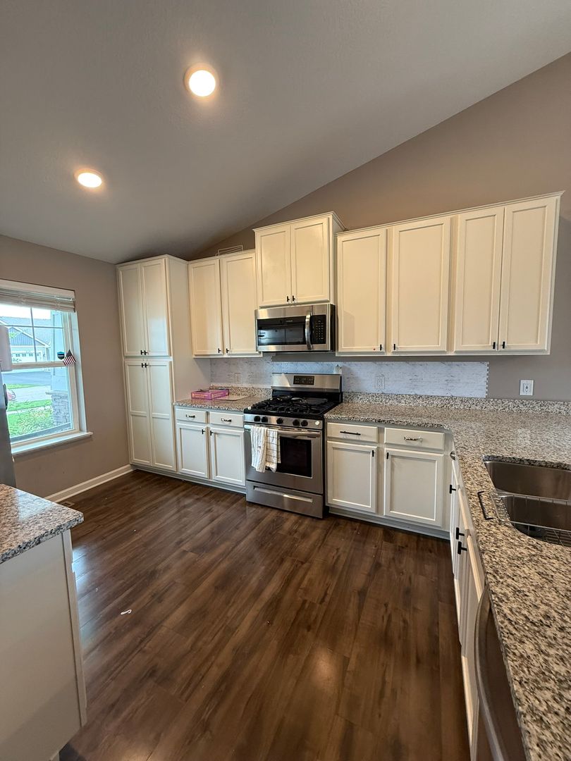 Woodbury House: 8530 Titanium Circle