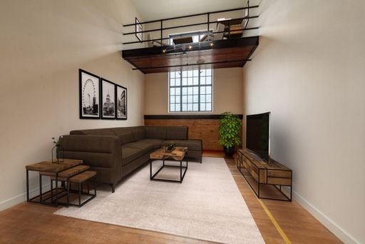 Spacious and contemporary 1 bedroom apartment in former basketball court – photo 1