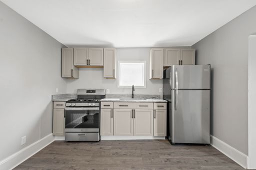 NEWLY RENOVATED BALDWIN BOMBSHELL IN A BEAUTIFUL NEIGHBORHOOD!!! LARGE BACKYARD! – photo 1