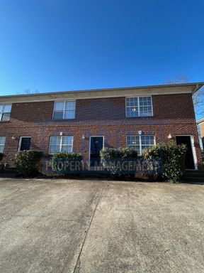 Conveniently located two bedroom townhome! – photo 1