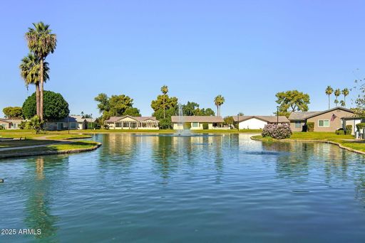 Welcome to this stunning updated 2-bedroom, 2-bathroom home on a lake located in the vibrant community of Leisure World, a 45+ Active Adult Resort Community. Available for June through October 2026. Summer Rental only. – photo 1