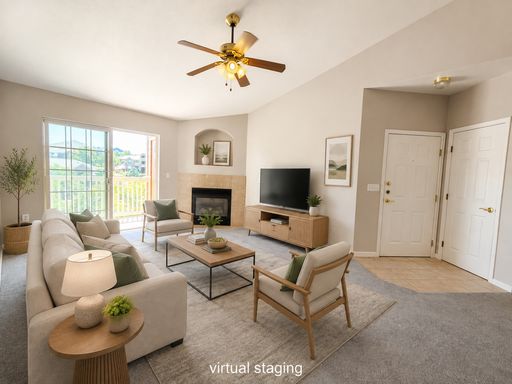 Top-Floor Condo with Vaulted Ceilings, Mountain Views & Garage in Cherry Creek Schools – photo 1
