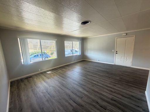 Upgraded 2/2 w/ 1080 sf. Large rooms, nice patio with small yard, parking outside your door. – photo 1