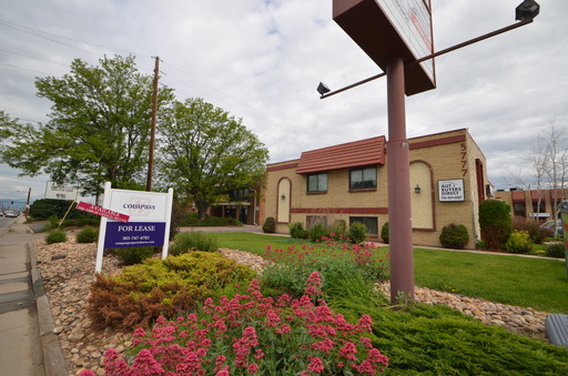 Private Office Space w/ entrance from parking lot and signage on Evans! Central, convenient location w/ on-site management – photo 1