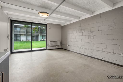 MODERNIZED SECOND FLOOR STUDIO WITH VAULTED CEILINGS AND PATIO – photo 1