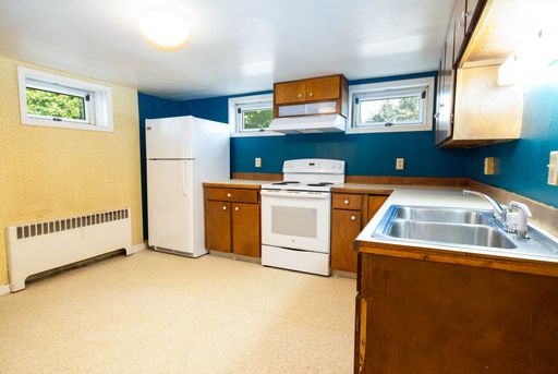 Charming 2-Bedroom Apartment Near MSU – All Utilities Included! – photo 1