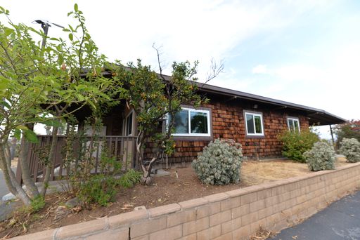 Charming Single Level 3 Bedroom 2 Bath Home perched on hill!