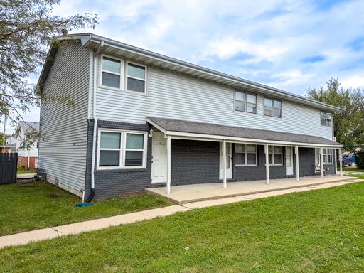$250 Move-In Credit! Spacious 2-Bedroom Townhome with Full Basement in Normal – photo 1
