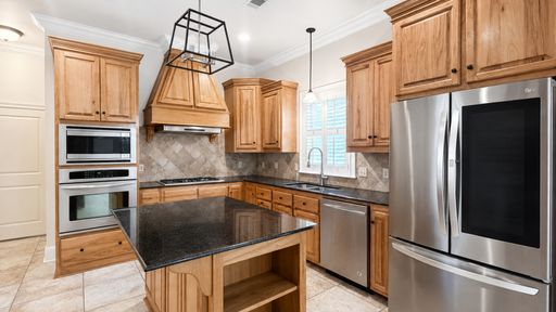 4-Bedroom Executive-Style Lakefront Home with Private Mother-in-Law Suite