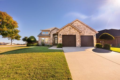 Custom Windsor Home on Corner Lot with Green Space Views – photo 1