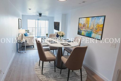 This Spacious Top-Floor 2-Bedroom with City Views, Balcony & In-Unit Laundry! – photo 1