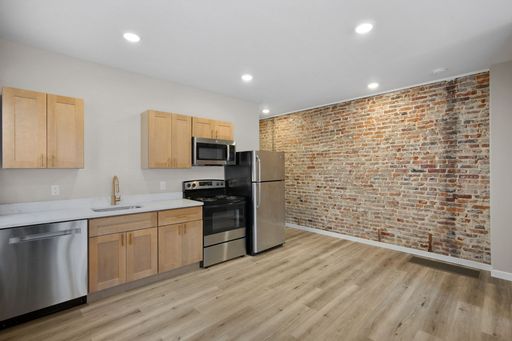 2 bed 2 bath Full Remodel | Off-Street Parking | Exposed Brick | In- Unit Laundry – photo 1