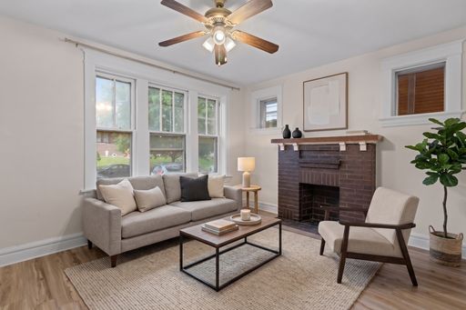 Bright First Floor Unit with Gorgeous Natural Light, Basement Laundry & Off-Street Parking!! Flex Room added – photo 1