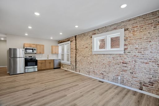2 bed 2 bath Full Remodel | Off-Street Parking | Exposed Brick | In- Unit Laundry – photo 1