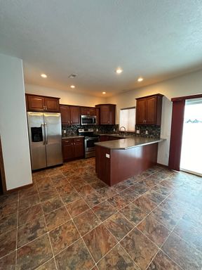 3 Bed 2.5 Bath Rental at 1524 35th Ave SE, Minot, ND – photo 1