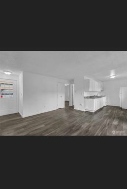 Lower unit that has been completely remodeled. Bright and spacious, convenient location and affordable. W/D on site, parking and large yard. – photo 1