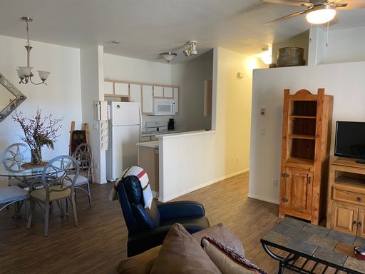Charming, furnished, ground floor Condo with attached garage, pool and amenities