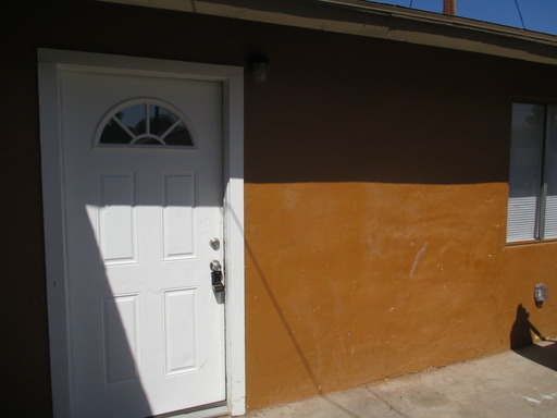Triplex unit w Small side yard – photo 1