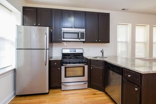 Gorgeous Gut Rehab in West Ridge – photo 1