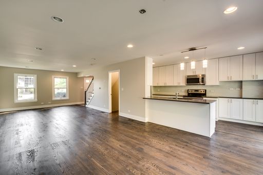 ENTIRELY RENOVATED + RARELY AVAILABLE TOWNHOME FOR RENT