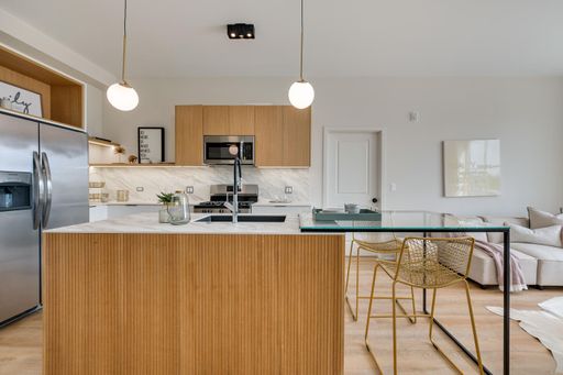 MODERN UPSCALE 1 + 2 BEDROOM UNITS WITH ROOFTOP DECK AND NEW CONSTRUCTION