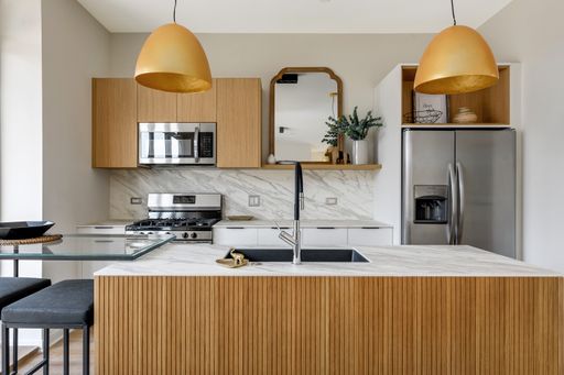 MODERN UPSCALE 1 + 2 BEDROOM UNITS WITH ROOFTOP DECK AND NEW CONSTRUCTION FINISHES