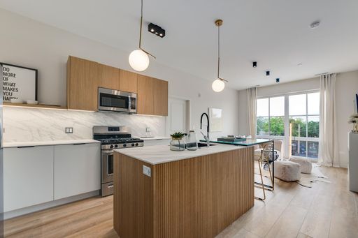 MODERN UPSCALE 1 + 2 BEDROOM UNITS WITH ROOFTOP DECK AND NEW CONSTRUCTION