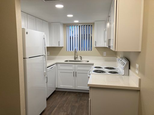 Just Renovated - this stunning apartment features quartz countertops, recessed lighting & much more! – photo 1