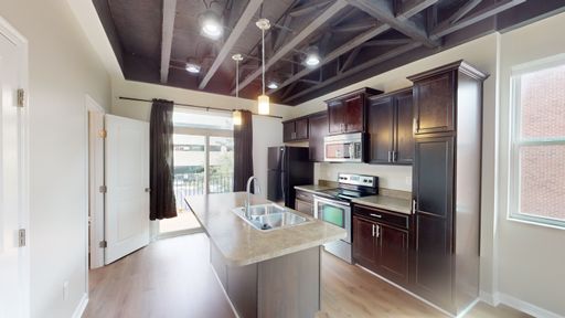Beautiful 2 bedroom, 1.5 bath townhome with 1 car attached garage and reserved parking space in Downtown Dayton near Riverscape – photo 1