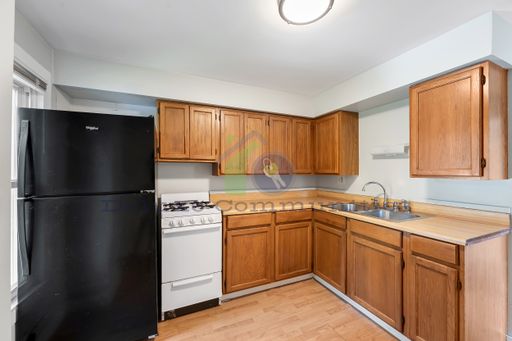 One Bedroom- upper unit in West Side- Now Available – photo 1