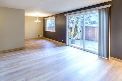 Remodeled / Ground Floor / Private Fenced Yard / W/D in Unit / Vinyl Plank Flooring / Northgate / Greenwood – photo 1