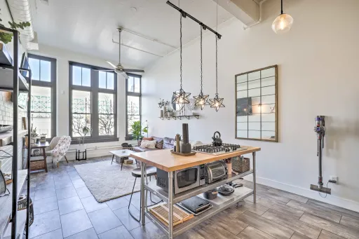Historic Downtown Loft | Secure Garage Parking, Rooftop Access & Turn-Key Options – photo 1