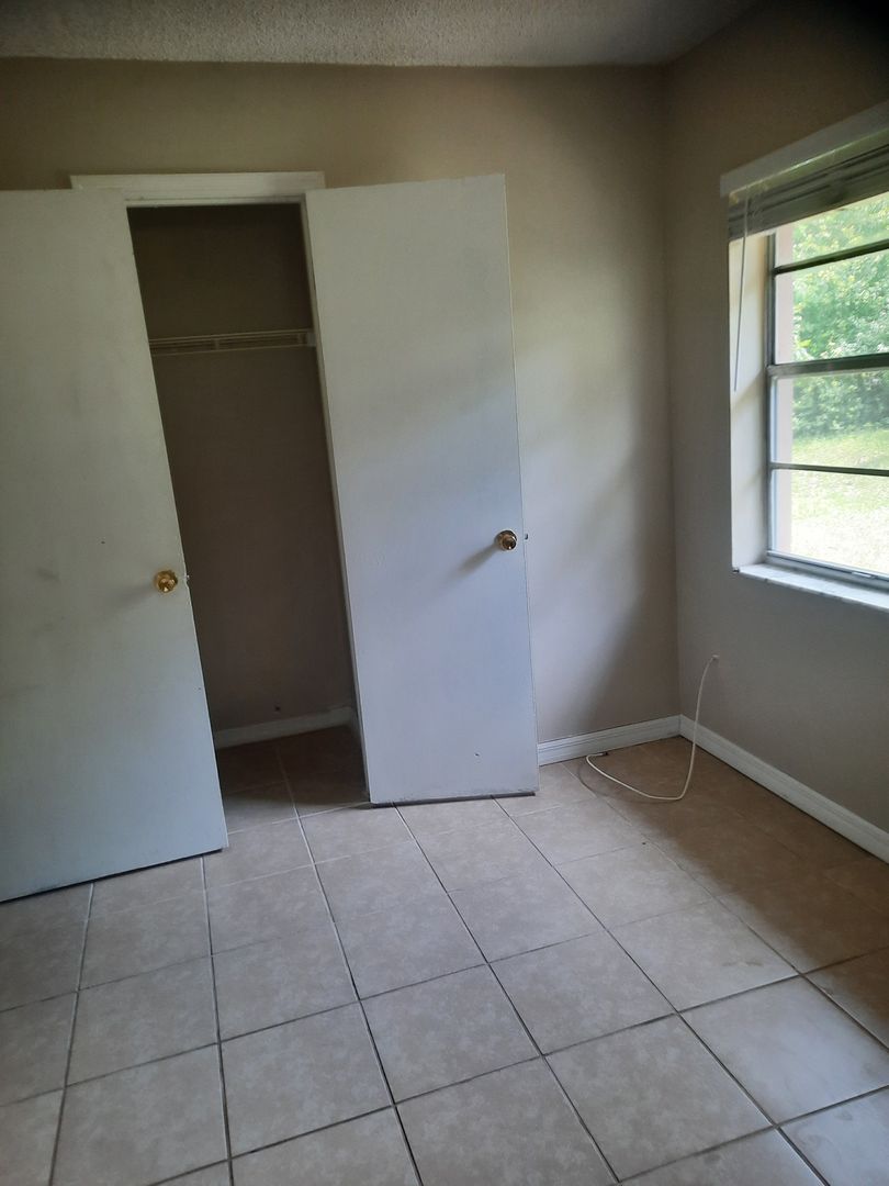 Lady Lake Apartment: 103 through 116 Neil Court