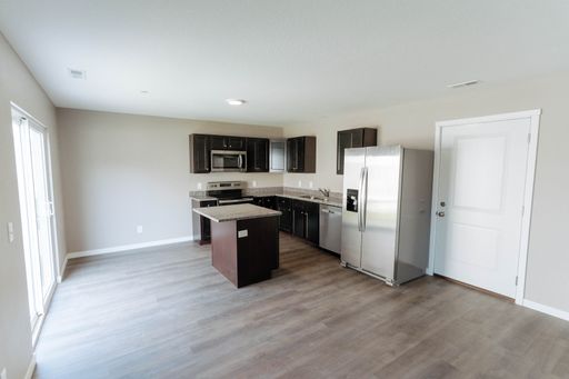 Two story, 2 bedroom townhouse with large rooms and upper level laundry