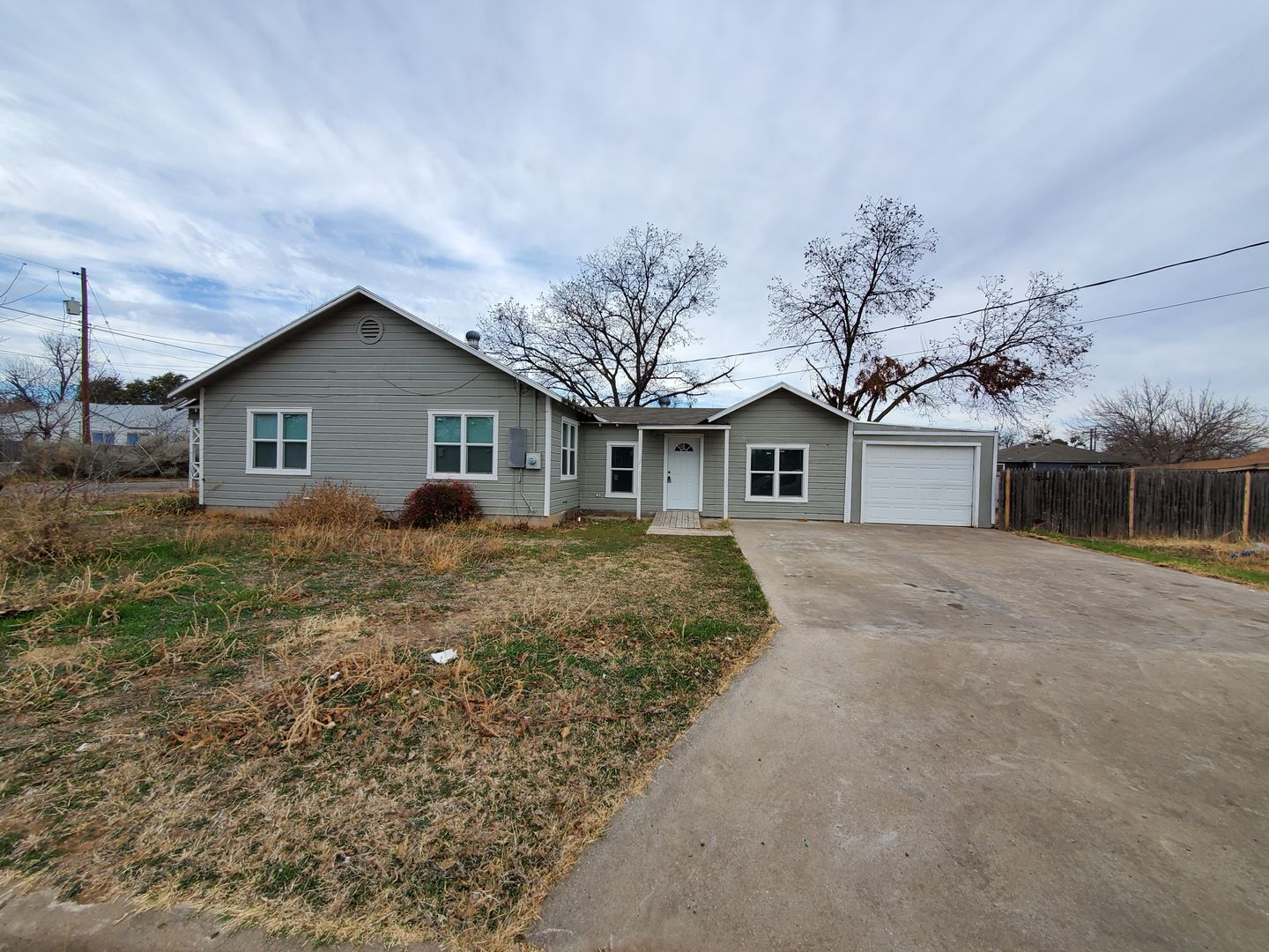 Large remodeled 3 bedroom home with open kitchen on a corner lot! 