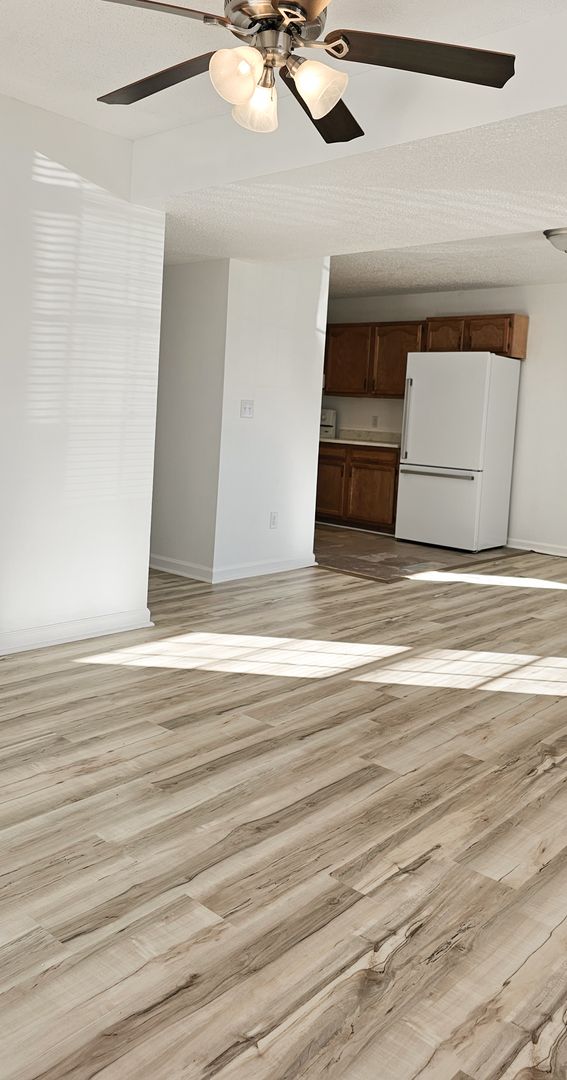 **Move-In Special: August free - Deposit moves you in** Beautifully updated 4 Bedroom/2 Bathroom downstairs apartment 2 of 12