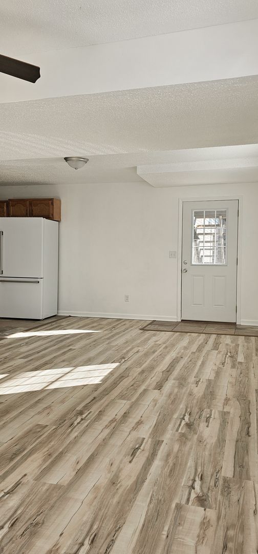 **Move-In Special: August free - Deposit moves you in** Beautifully updated 4 Bedroom/2 Bathroom downstairs apartment 3 of 12