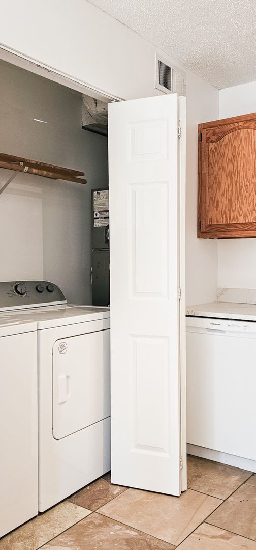 Laundry room at ***Hot Fall Special- Deposit moves you in! No rent until October 15th. *** Beautifully updated 4 Bedroom/2 Bathroom downstairs apartment (1 of 3)