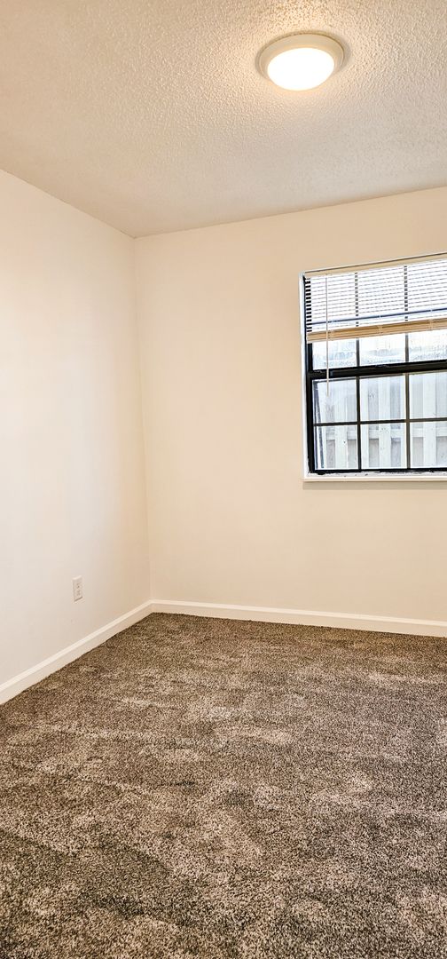 **Move-In Special: August free - Deposit moves you in** Beautifully updated 4 Bedroom/2 Bathroom downstairs apartment 6 of 12