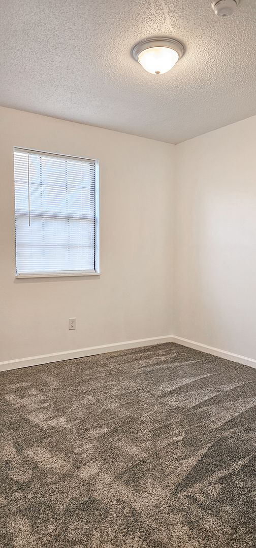 **Move-In Special: August free - Deposit moves you in** Beautifully updated 4 Bedroom/2 Bathroom downstairs apartment 9 of 12