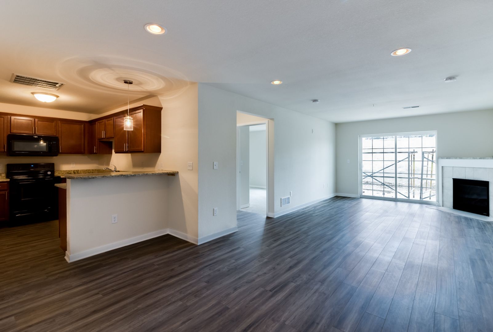 Slinger Apartment: 710,720 Cedar Bluffs Way