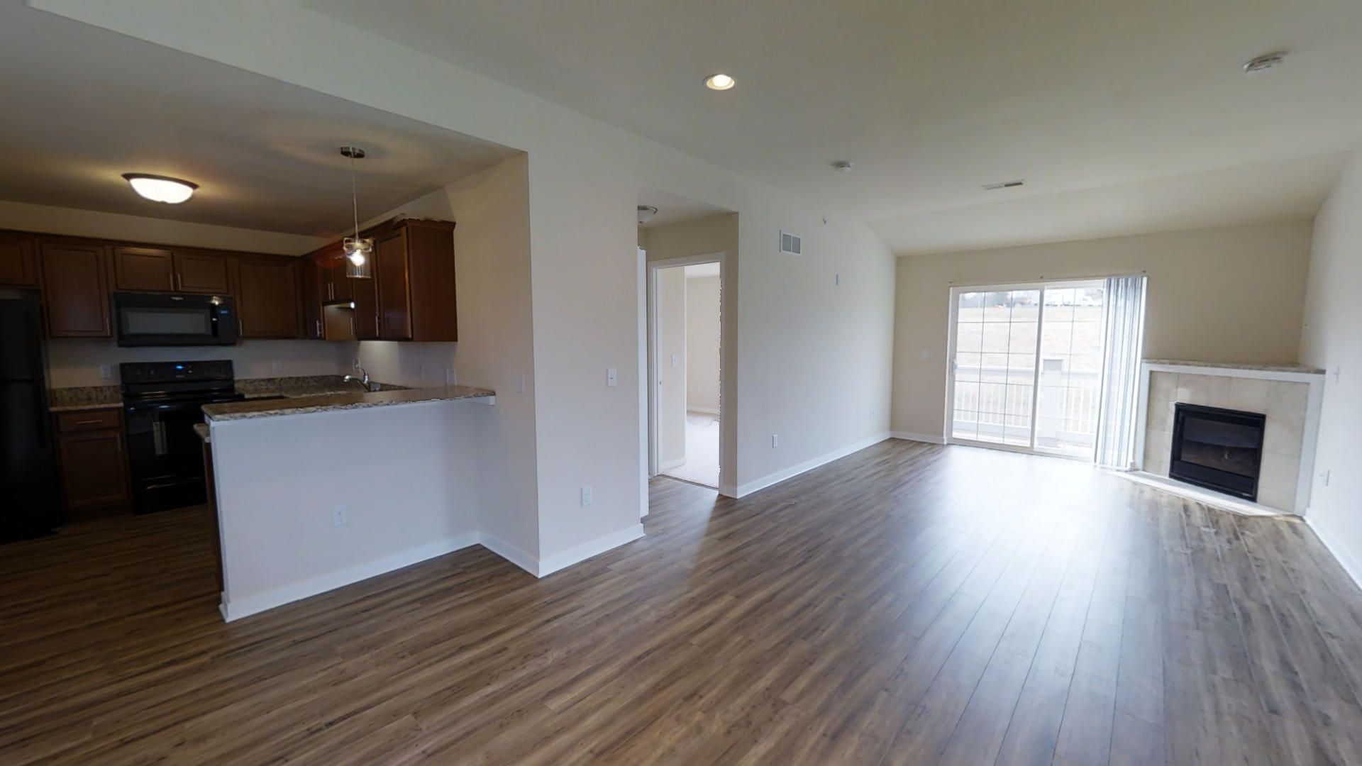 Slinger Apartment: 710,720 Cedar Bluffs Way