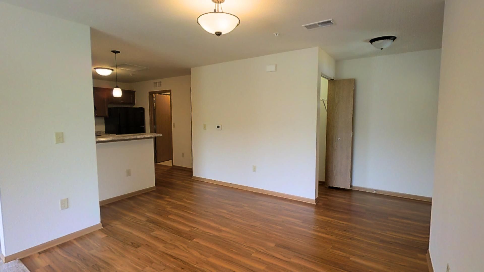 Slinger Apartment: 605,615,625 Cedar Bluffs Way