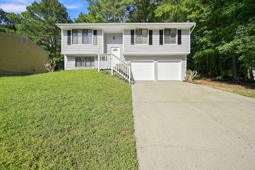 Recently Renovated Split-Level Home with Deck & 2-Car Garage – photo 1