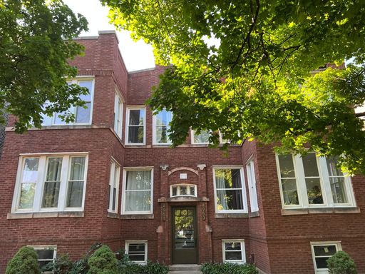Update Portage Park 3 bedroom 1 Bath with in unit laundry – photo 1