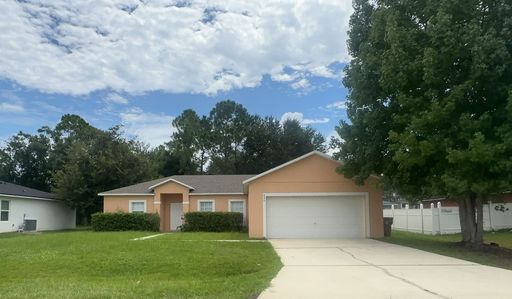 3/2 in Poinciana Kissimmee on the Osceola side with 2 car garage – photo 1