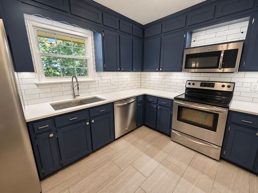 Two-Deck 4-Bed/3-Bath Home with 2-Car Garage in East Brainerd – photo 1