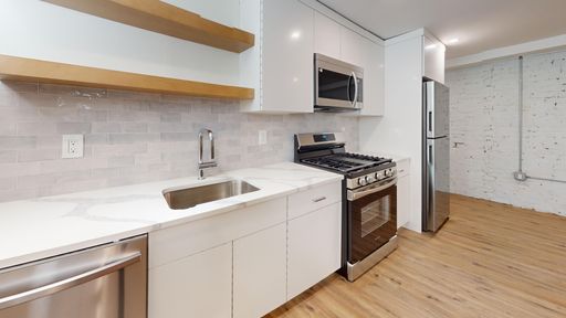 Charming 1 Bed 1 Bath Garden Level Apt w/ In-Unit Laundry + Central Air | 1 MONTH RENT FREE – photo 1