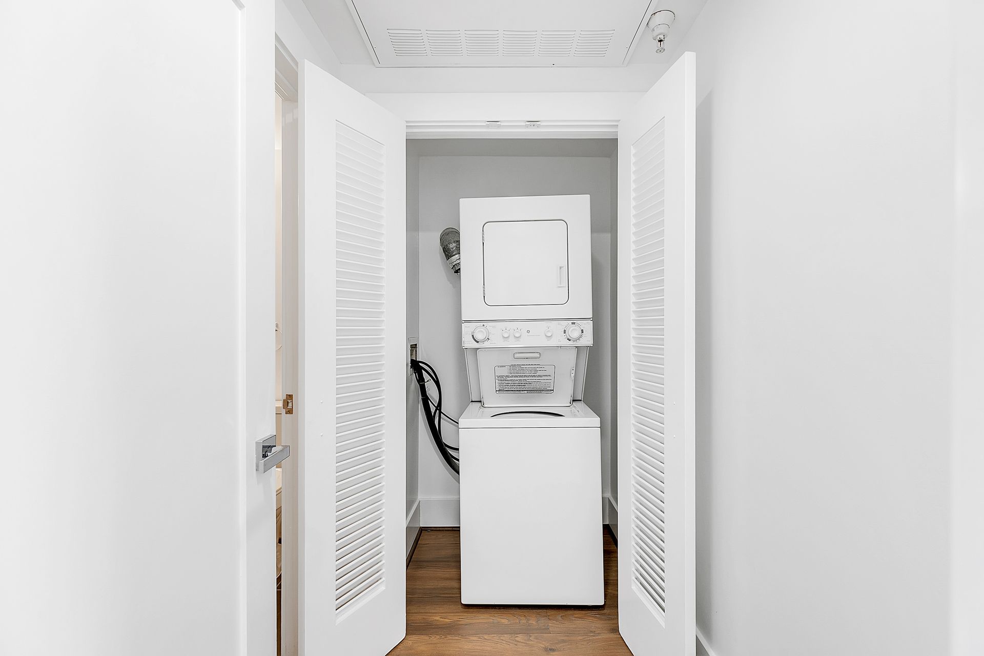 Laundry room at The Harlan Residences (2 of 3)